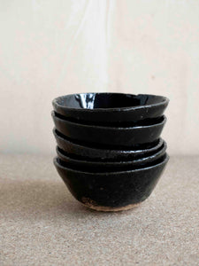 hand built black ceramic cups by the French potter Jérôme Hirson