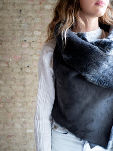 close-up of grey sleeveless lambskin jacket by atelier Les Henriettes