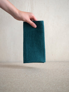 high quality linen napkin in a green blue colour and with waffle texture at M AAH