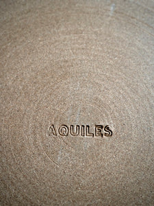 Aquiles logo stamp in stoneware