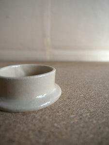 close-up of hand built ceramic candle holder at M AAH