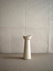 beige ceramic candle holder with rough texture at M AAH