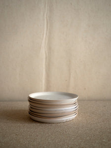 set of handmade small ceramic plates at M AAH
