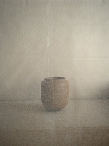 blurred ceramic object in brown clay at M AAH