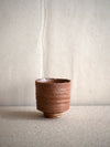 red brown wood fired ceramic cup by Tomasz Niedziolka
