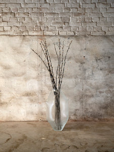 long glass vase by Vanessa Mitrani in transparent colour