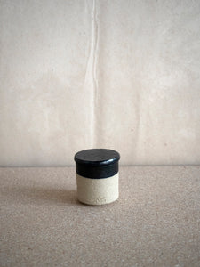 hand poured scented candle with ceramic lid at M AAH