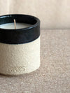 scented candle in stoneware with a black glaze by WAKS